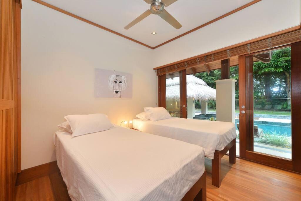 Cowrie House - Luxury 4 Bedroom Beachfront Home Port Douglas Eksteriør bilde